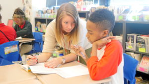 KIPP DC AIM's Ashleigh Rose helps a student