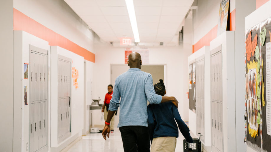 KIPP DC teacher and student walking