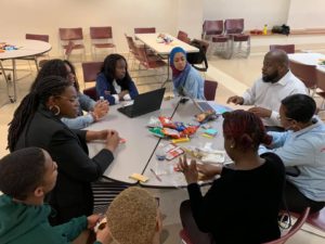 students gather to discuss safe passage