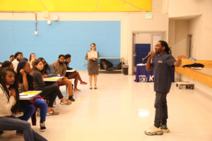 Trayon White talks to students