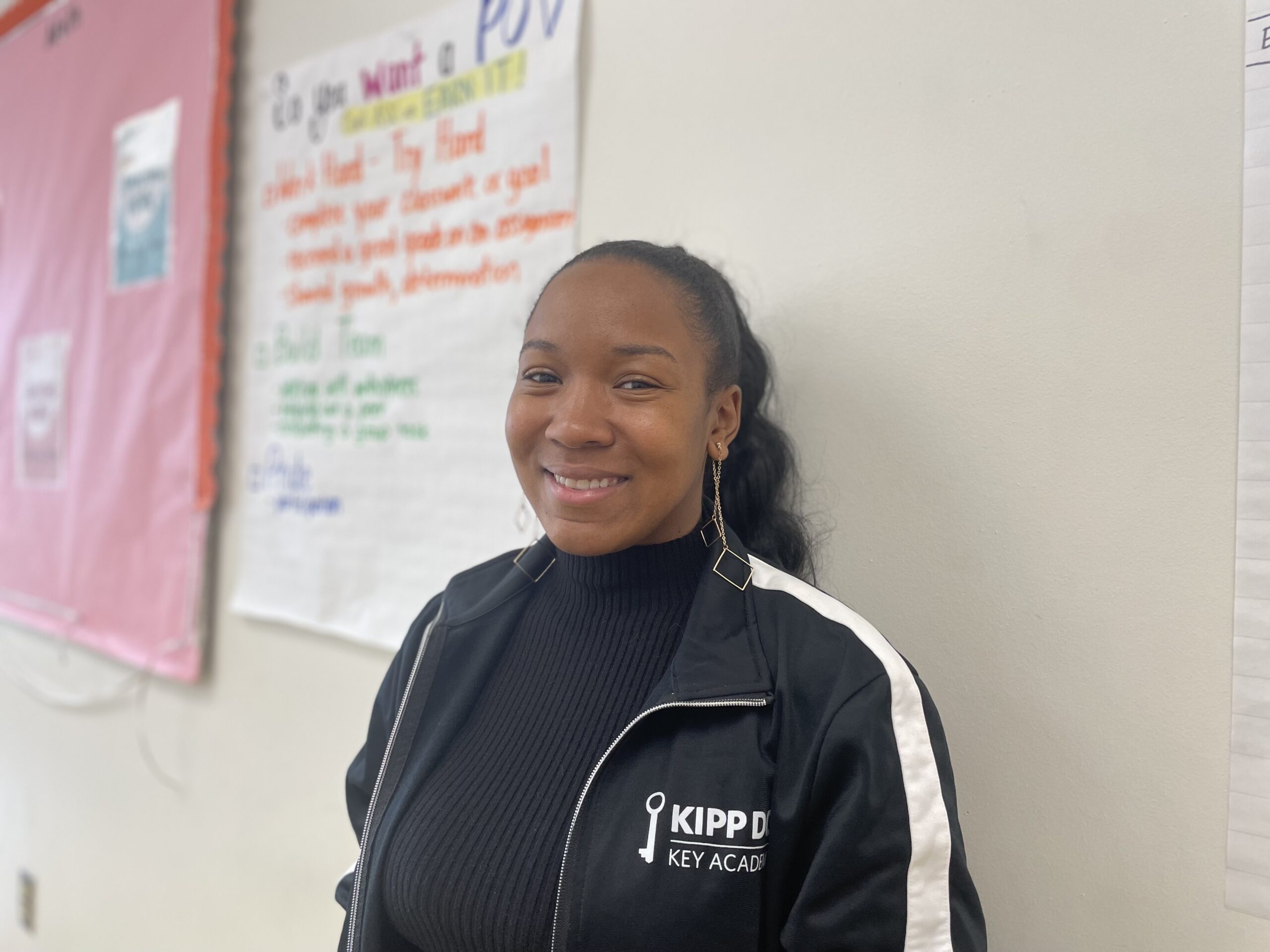 Homeroom teacher, Ms. Chavonna Brooks, smiling into the camera