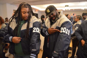 Jacket Ceremony Attendees Trying On Their Jackets